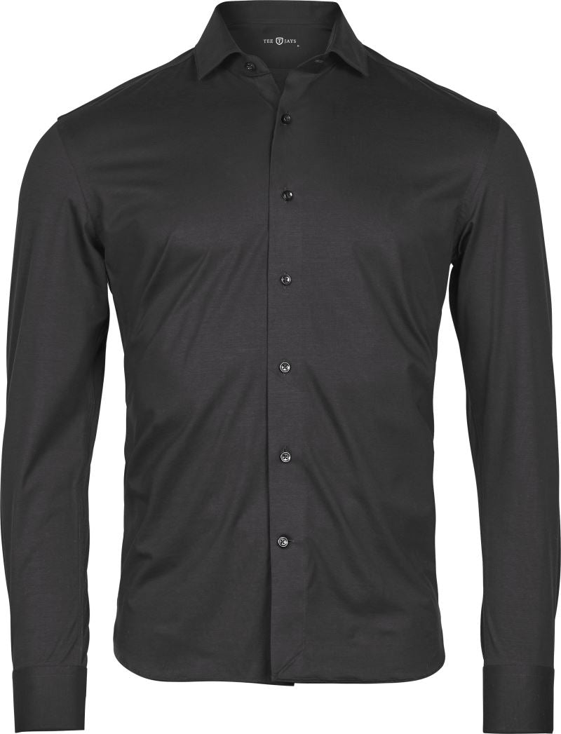Aktivna raztegljiva srajca z dolgimi rokavi TEE JAYS model 4030, modra, mehka tkanina, prikazana na modelu.