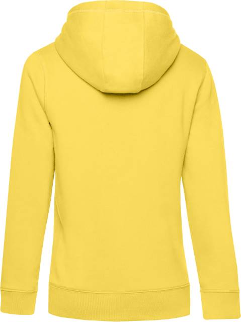 Ženska kapuca s sweatshirtom B&C Queen v rumeni barvi, prikazana na modelu, z žametnim videzom in kapuco.